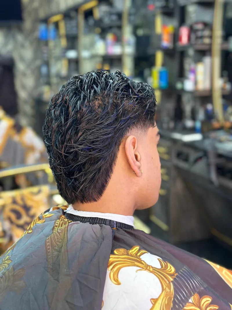 The finishing of a haircut from behind